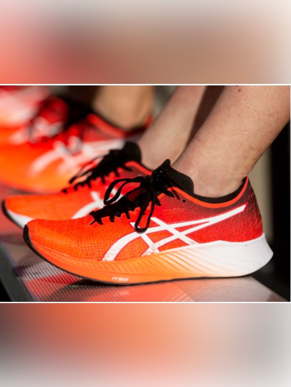 Asics Bright Orange Running Sneakers with Black Accents